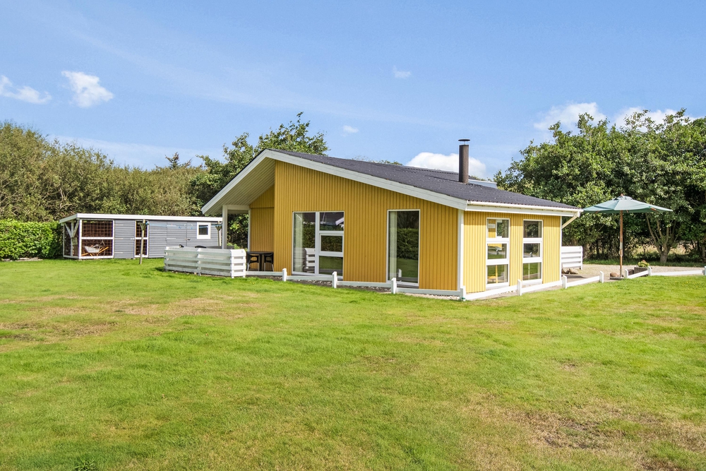 Familienfreundliches Holzhaus mit Kamin und tollem Garten